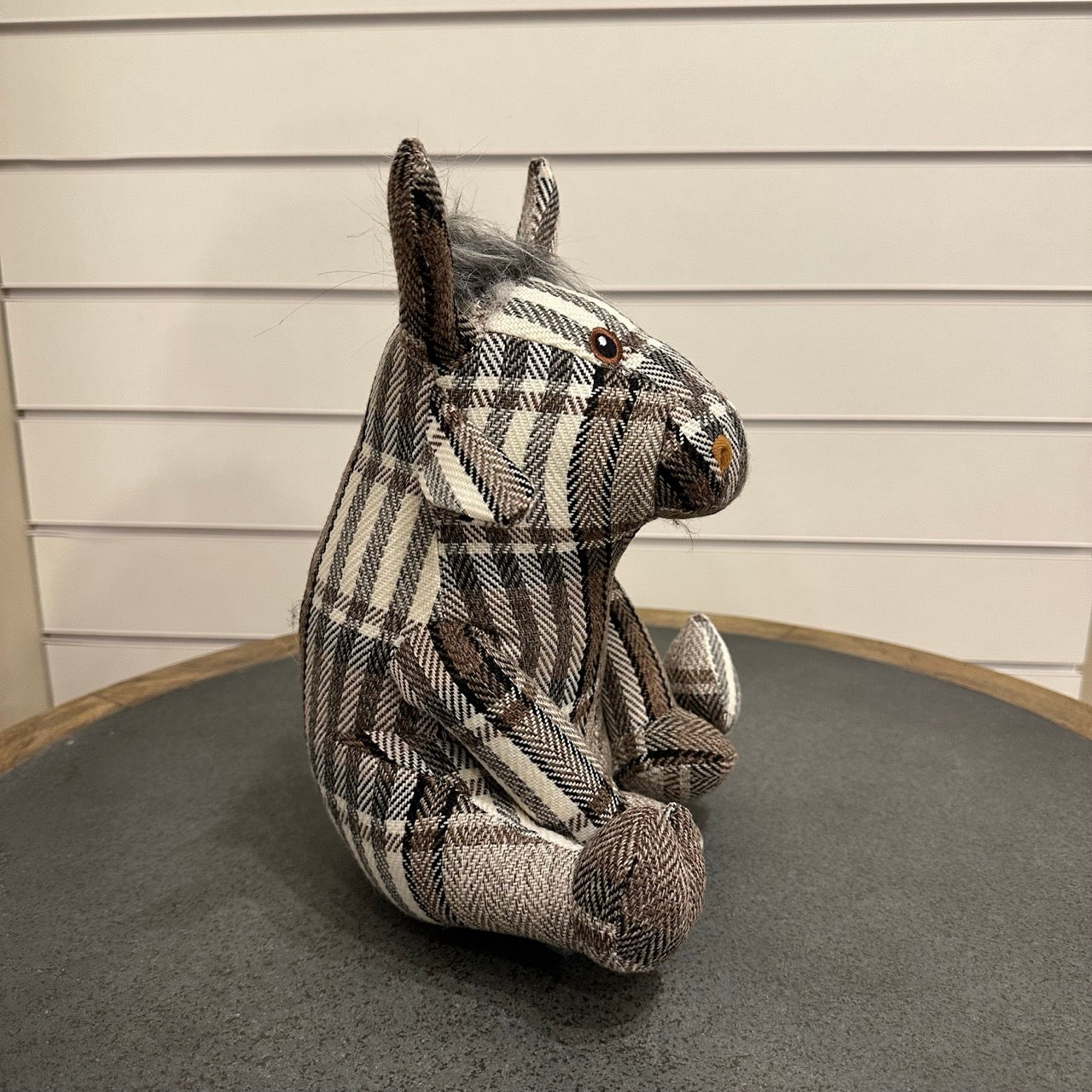 Highland Cow doorstop - grey and brown tartan