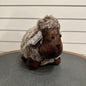 Brown and grey sheep door stop