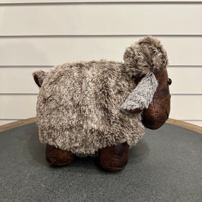 Brown and grey sheep door stop