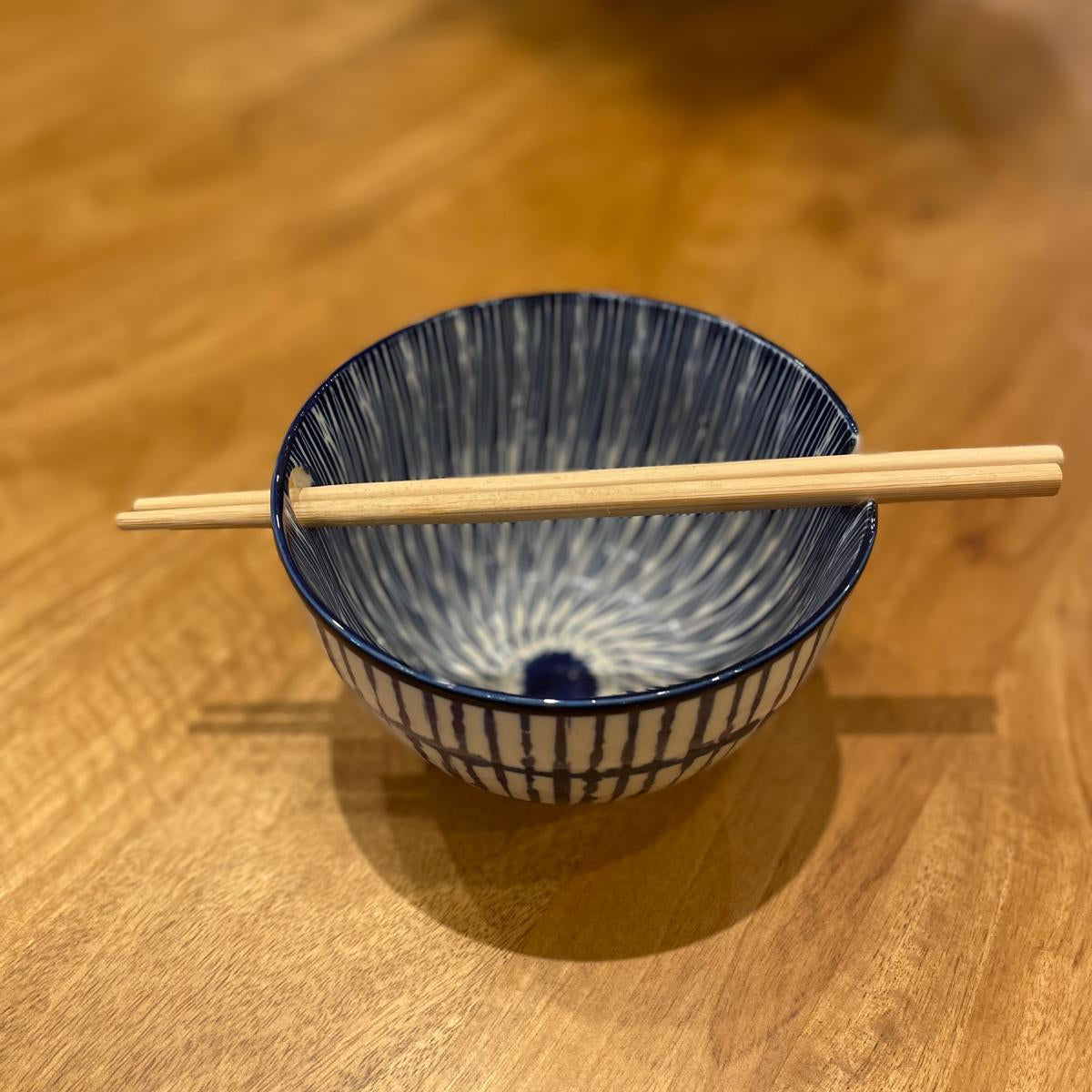 Blue And White Patterned Bowl With Chop Sticks
